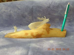 Sculpture : Le Cerf brâme et rassemble ses biches / Bone Carving